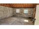 Unfinished basement space with two windows and cinder block walls at 1331 Walker Ave, Atlanta, GA 30344