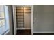 Well-organized closet featuring shelving, hanging rods, maximizing storage space and providing a functional storage solution at 1331 Walker Ave, Atlanta, GA 30344