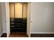 Walk-in closet featuring adjustable shelving, hanging racks, and ample storage space for organized wardrobe solutions at 1331 Walker Ave, Atlanta, GA 30344
