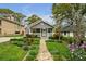 Charming gray home with a welcoming front porch and professionally landscaped front yard at 1331 Walker Ave, Atlanta, GA 30344