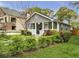 Charming gray home with a covered front porch, pretty yard and fresh landscaping at 1331 Walker Ave, Atlanta, GA 30344