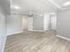 Bright bedroom featuring multiple closets, wood floors, and natural light at 6095 Blackberry Ln, Buford, GA 30518