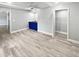 Spacious bonus room with a built-in wet bar and a walk-in closet at 6095 Blackberry Ln, Buford, GA 30518
