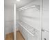 A walk-in closet with white wire shelving for storage at 6095 Blackberry Ln, Buford, GA 30518