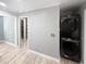 Convenient laundry area features a stacked washer and dryer for efficient space utilization at 6095 Blackberry Ln, Buford, GA 30518