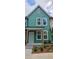 Charming two-story townhome with a colorful exterior, inviting front porch, and well-manicured landscaping at 1095 Tucker Ave # 203, Atlanta, GA 30310