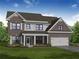 Charming two-story brick home with covered porch and two car garage at 409 West March Cir, Loganville, GA 30052