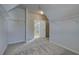 Walk-in closet with carpet, shelving, and a bathroom at 409 West March Cir, Loganville, GA 30052