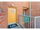 Brick building exterior with yellow door and small balcony at 385 Ralph Mcgill Ne Blvd # E, Atlanta, GA 30312