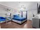 Spacious main bedroom with a gray platform bed and blue bedding at 385 Ralph Mcgill Ne Blvd # E, Atlanta, GA 30312