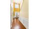 Bright foyer with hardwood floors, high ceilings, and a large window above the front door at 532 Goldfinch Way, Stockbridge, GA 30281