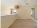 Open loft area with neutral carpeting, bright lighting, and ample space, great for a study or play area at 532 Goldfinch Way, Stockbridge, GA 30281