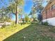 View of the backyard featuring mature trees and lush greenery at 3801 Orchard Se Rd, Smyrna, GA 30080