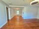 Bright living room with hardwood floors, white walls, and an open layout at 3801 Orchard Se Rd, Smyrna, GA 30080