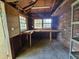 A storage shed featuring shelving, a built-in work bench, and windows at 3801 Orchard Se Rd, Smyrna, GA 30080