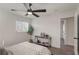 Bright bedroom with a ceiling fan and access to hallway at 3611 Hillsborough Ln, Decatur, GA 30032