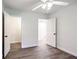 Simple bedroom with wood-look floors and ceiling fan at 3611 Hillsborough Ln, Decatur, GA 30032