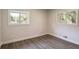 Simple bedroom with gray walls and wood-look floors at 3611 Hillsborough Ln, Decatur, GA 30032