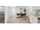 Bright dining area features a round table and four black chairs at 3611 Hillsborough Ln, Decatur, GA 30032