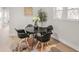 Dining area with a round table and four black chairs at 3611 Hillsborough Ln, Decatur, GA 30032