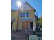 New construction exterior with fiber cement siding, professionally landscaped homesite, and exterior designs at 1095 Tucker Ave # 208, Atlanta, GA 30310