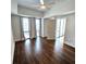 Bright bedroom with hardwood floors and multiple windows that offers ample light at 1100 Howell Mill Rd # 404, Atlanta, GA 30318