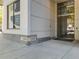 A well-maintained building entrance with glass doors and clear signage at 1100 at 1100 Howell Mill Rd # 404, Atlanta, GA 30318