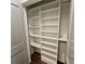 Closet with custom built-in shelving that offer ample storage and organization possibilities at 1100 Howell Mill Rd # 404, Atlanta, GA 30318