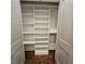 Organized closet interior featuring built-in shelving and a clothing rod for efficient storage solutions at 1100 Howell Mill Rd # 404, Atlanta, GA 30318