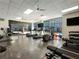 Well-equipped fitness center with modern exercise equipment, natural light, and mirrors for workouts at 1100 Howell Mill Rd # 404, Atlanta, GA 30318