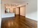 Hardwood floors and natural light accent the open concept living room and kitchen at 1100 Howell Mill Rd # 404, Atlanta, GA 30318