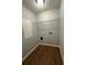 Laundry area with shelving and vinyl flooring at 2805 Vining Ridge Ter, Decatur, GA 30034