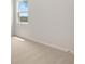 Cozy carpeted bedroom featuring neutral walls and natural light at 7530 Homer Dr, Cumming, GA 30028