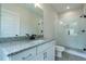 Modern bathroom with glass enclosed shower and granite countertops at 1709 Eastside Parc St, Atlanta, GA 30316