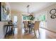 Dining room featuring modern lighting, table seating for six, and access to the outdoor space at 1709 Eastside Parc St, Atlanta, GA 30316
