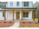Welcoming front porch with timber columns and a brick-lined walkway at 1709 Eastside Parc St, Atlanta, GA 30316
