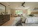Spacious main bedroom with large windows, light hardwood floors, and stylish decor, offering a serene and elegant retreat at 1709 Eastside Parc St, Atlanta, GA 30316