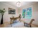 Bright office space with a large window, wainscoting, and stylish decor, offering a productive and inspiring workspace at 1709 Eastside Parc St, Atlanta, GA 30316