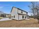 View of the backyard and patio, showcasing ample yard space and the home's exterior at 1697 Eastside Parc St, Atlanta, GA 30316