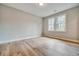 Bright bedroom with hardwood floors, and white trim at 1697 Eastside Parc St, Atlanta, GA 30316