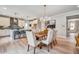 Dining area with a view of the modern kitchen and living space at 1697 Eastside Parc St, Atlanta, GA 30316