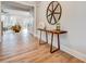 Hallway with light hardwood floors and decorative accents at 1697 Eastside Parc St, Atlanta, GA 30316
