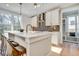 Bright kitchen with a large island, modern appliances, and a view of the outdoors at 1697 Eastside Parc St, Atlanta, GA 30316