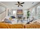 Living room showcases a modern fireplace, neutral tones, and ample windows at 1697 Eastside Parc St, Atlanta, GA 30316