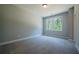 Comfortable bedroom with ample natural light and neutral décor, offering a relaxing retreat for rest and relaxation at 1702 Eastside Parc St, Atlanta, GA 30316