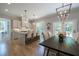A large island with bar stool seating and views to the dining area highlight this contemporary kitchen at 1702 Eastside Parc St, Atlanta, GA 30316