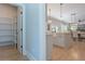 Bright, open kitchen featuring an island, modern lighting, and stainless steel appliances at 1702 Eastside Parc St, Atlanta, GA 30316