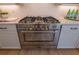 Close up of range and oven in a modern kitchen at 1702 Eastside Parc St, Atlanta, GA 30316