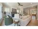 Well-designed living room with fireplace, staircase, and an open layout leading to the front entrance at 1702 Eastside Parc St, Atlanta, GA 30316