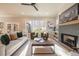 Inviting living room with a fireplace and lots of natural light at 1702 Eastside Parc St, Atlanta, GA 30316